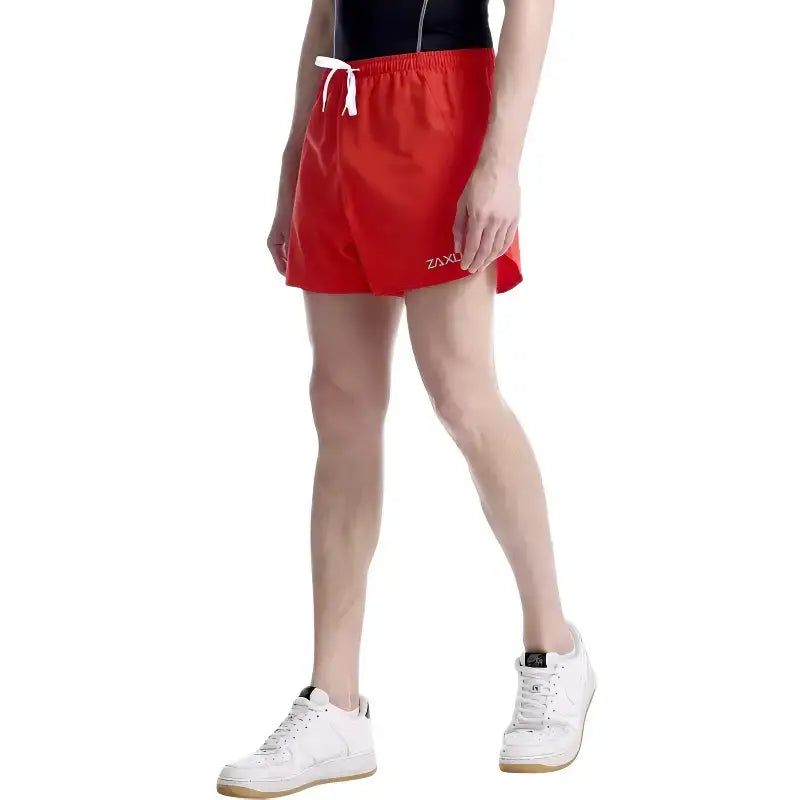 Short court sport homme polyester