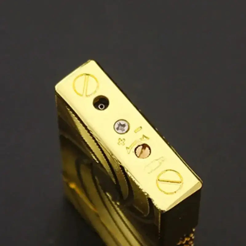Briquet tempête luxe finition dorée spirales
