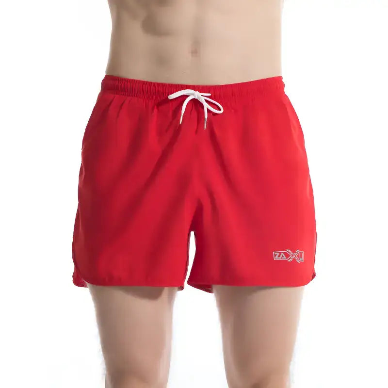 Short court sport homme polyester