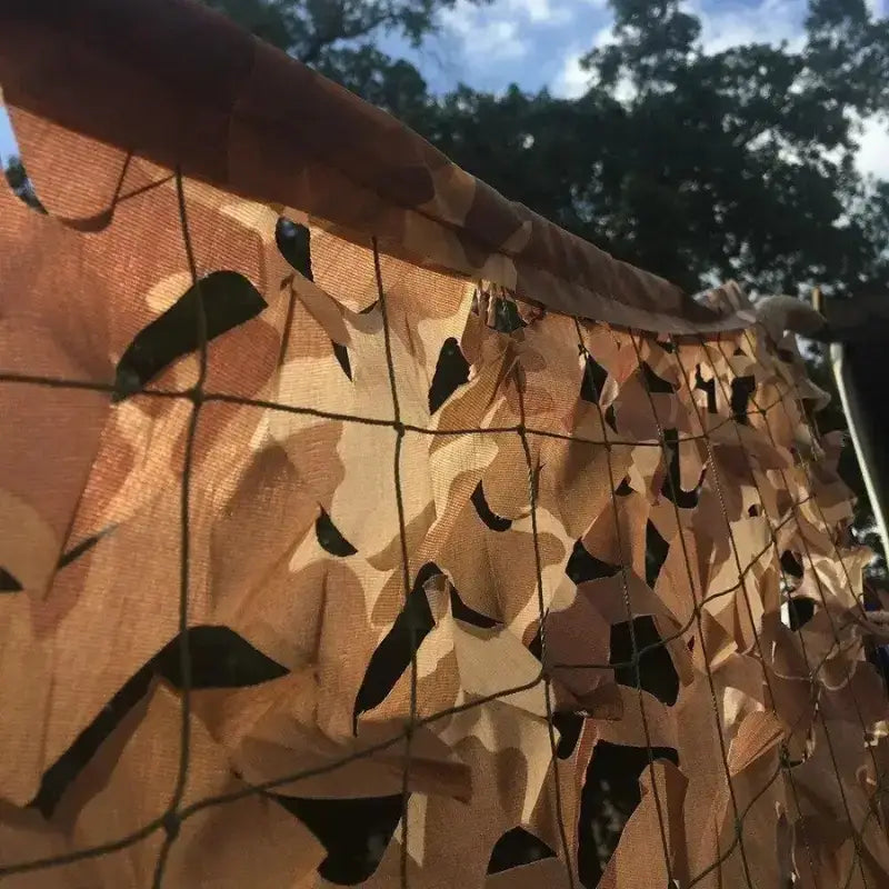 Filet camouflage sable désert aride beige
