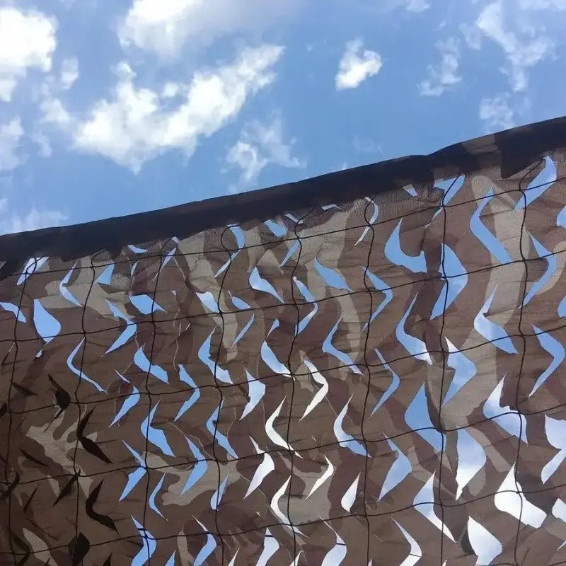 Filet camouflage sable désert aride beige