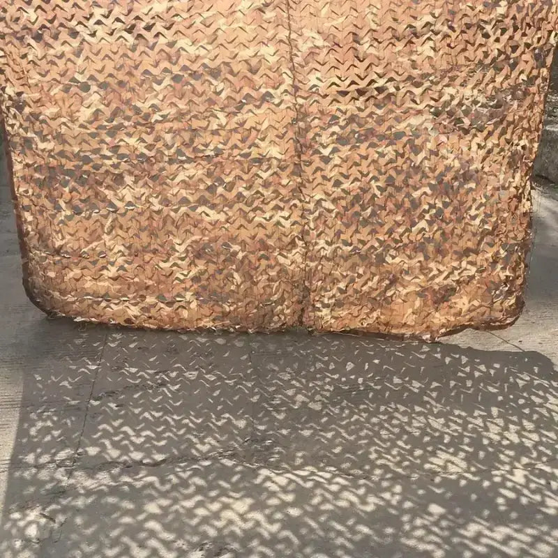 Filet camouflage sable désert aride beige