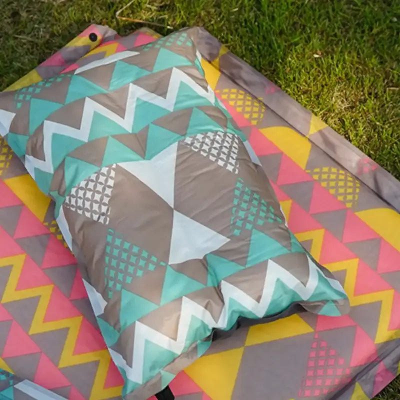 Oreiller camping mousse pvc coloré